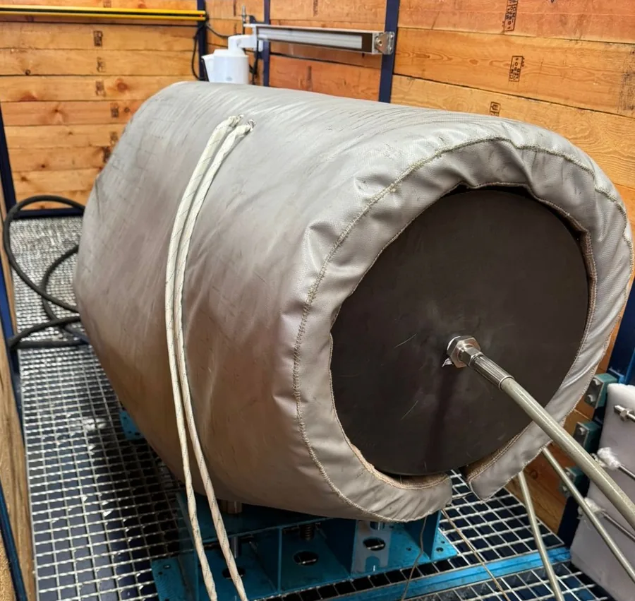 Casing test specimen with its insulated cover in place on the MCT test bay